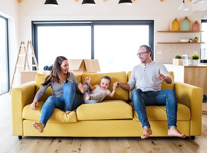 Family on a sofa — Grapevine, TX — Silvas Law, PC